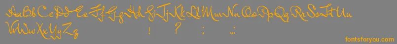 フォントInductiveResonance – オレンジの文字は灰色の背景にあります。
