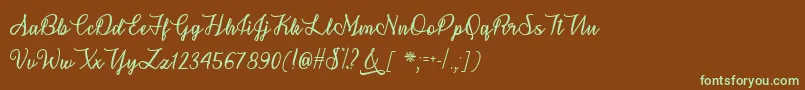 フォントSnowflakeCalligraphyTtf – 緑色の文字が茶色の背景にあります。