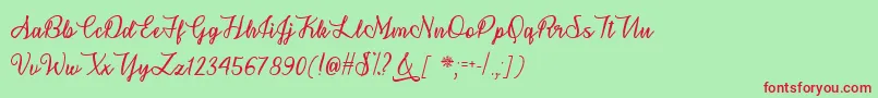 SnowflakeCalligraphyTtf-fontti – punaiset fontit vihreällä taustalla