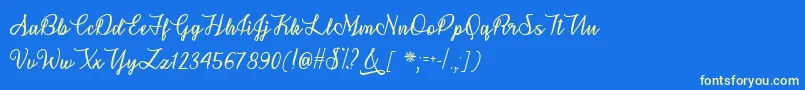 SnowflakeCalligraphyTtf Font – Yellow Fonts on Blue Background