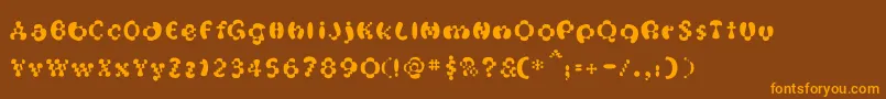 OakMagicmushroom-fontti – oranssit fontit ruskealla taustalla