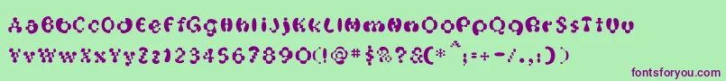 OakMagicmushroom-fontti – violetit fontit vihreällä taustalla