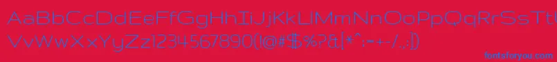 GruppoRegular-Schriftart – Blaue Schriften auf rotem Hintergrund