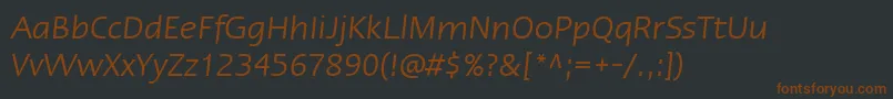 Шрифт LinotypeErgoItalic – коричневые шрифты на чёрном фоне