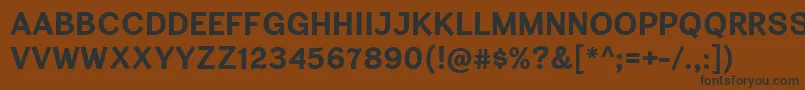 フォントCardiganTitlingBd – 黒い文字が茶色の背景にあります