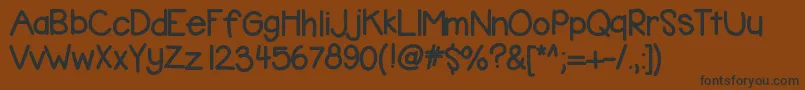Kbbubblegum-fontti – mustat fontit ruskealla taustalla