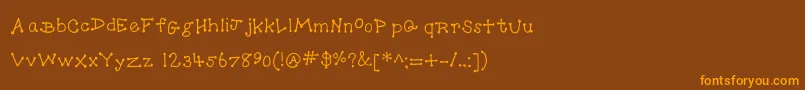 フォントDotToDot – オレンジ色の文字が茶色の背景にあります。