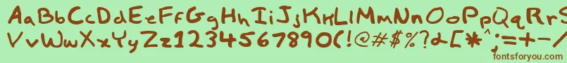 Child Font – Brown Fonts on Green Background