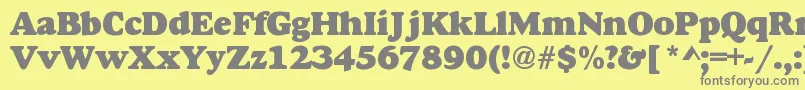 DoverHeavy-fontti – harmaat kirjasimet keltaisella taustalla