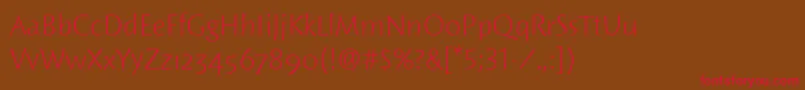 フォントWoodlandItcLight – 赤い文字が茶色の背景にあります。