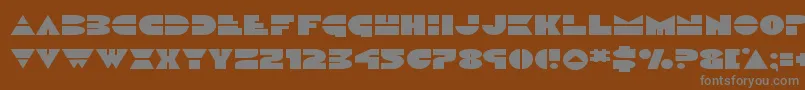 Saiba mais sobre a fonte Discoduckexpand Fonte Discoduckexpand – fontes cinzas em um fundo marrom