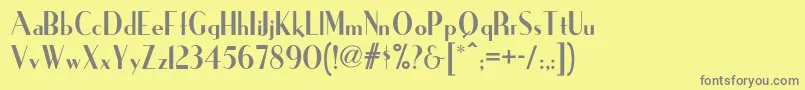 フォントIronicknf – 黄色の背景に灰色の文字