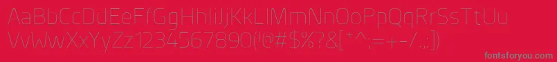 PlanerExtralight-Schriftart – Graue Schriften auf rotem Hintergrund