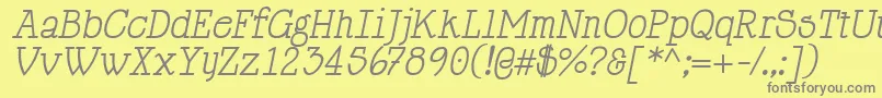 Fonte HappyPhantomItalic – fontes cinzas em um fundo amarelo