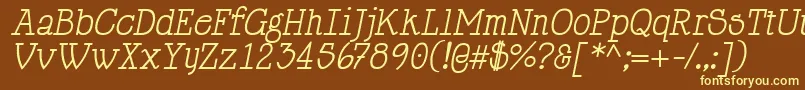 HappyPhantomItalic-fontti – keltaiset fontit ruskealla taustalla