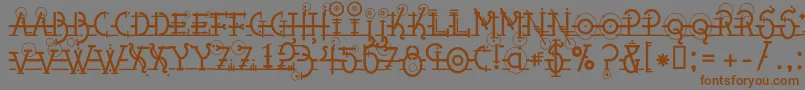 Snippletweak Font – Brown Fonts on Gray Background