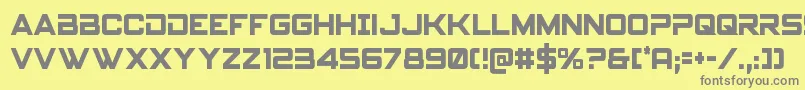 フォントSpyagencyv3cond – 黄色の背景に灰色の文字