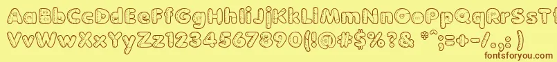 BonecaDePanoo Font – Brown Fonts on Yellow Background