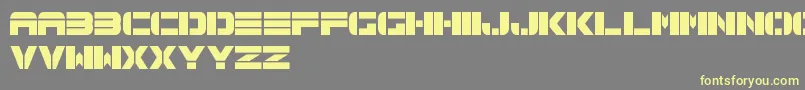Spac3TechFreePromo Font – Yellow Fonts on Gray Background