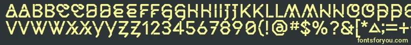 フォントMiddlecaseNextSolid – 黒い背景に黄色の文字