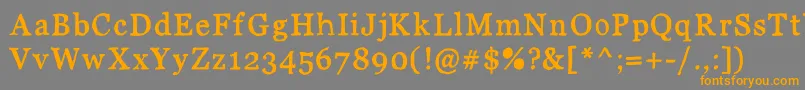 フォントJdCarnivalBlack – オレンジの文字は灰色の背景にあります。