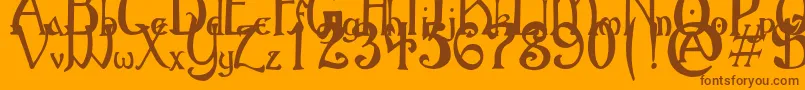 GothicBirthdayCake-Schriftart – Braune Schriften auf orangefarbenem Hintergrund