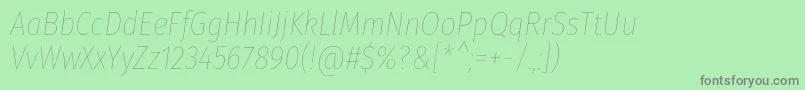 Czcionka FirasanscondensedHairitalic – szare czcionki na zielonym tle