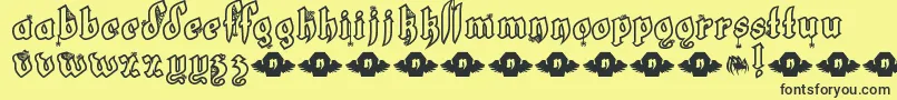 フォントLtWhiteFang – 黒い文字の黄色い背景