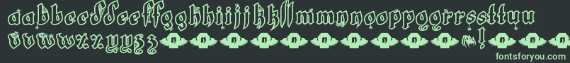 LtWhiteFang-Schriftart – Grüne Schriften auf schwarzem Hintergrund