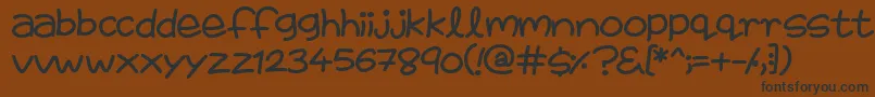 FairiesAreReal-fontti – mustat fontit ruskealla taustalla