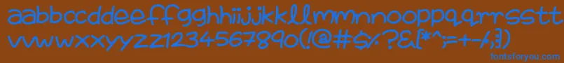 FairiesAreReal-Schriftart – Blaue Schriften auf braunem Hintergrund