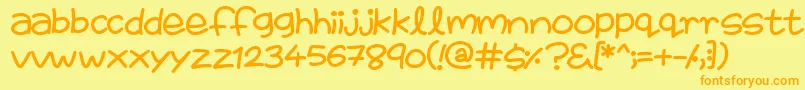 Шрифт FairiesAreReal – оранжевые шрифты на жёлтом фоне