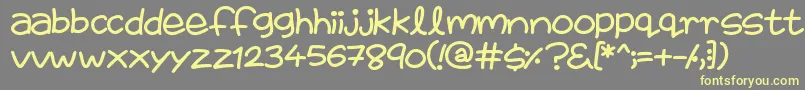 FairiesAreReal-Schriftart – Gelbe Schriften auf grauem Hintergrund