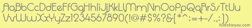 QuadrantaRegular-fontti – harmaat kirjasimet keltaisella taustalla