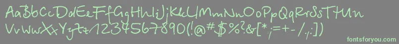 BetinascriptcttRegular Font – Green Fonts on Gray Background