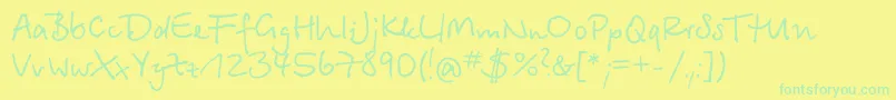 BetinascriptcttRegular Font – Green Fonts on Yellow Background