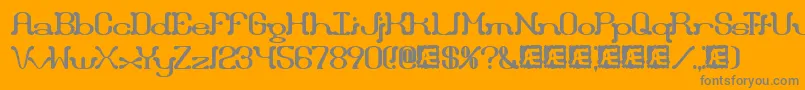 Lisätietoja Draggle-fontista Draggle-fontti – harmaat kirjasimet oranssilla taustalla