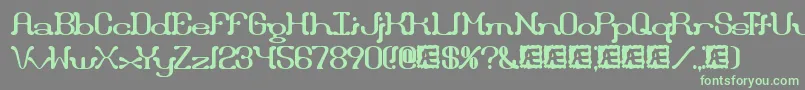 フォントDraggle – 灰色の背景に緑のフォント