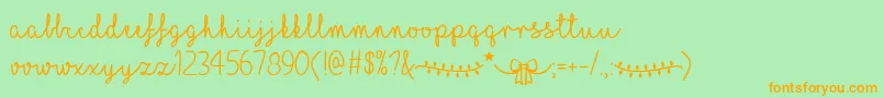 フォントILoveChristmas – オレンジの文字が緑の背景にあります。