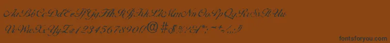 BallantinesrandomRegular Font – Black Fonts on Brown Background