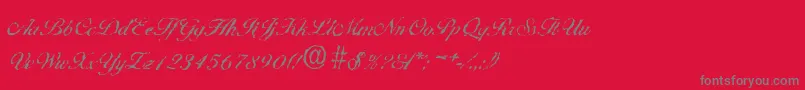 BallantinesrandomRegular-Schriftart – Graue Schriften auf rotem Hintergrund