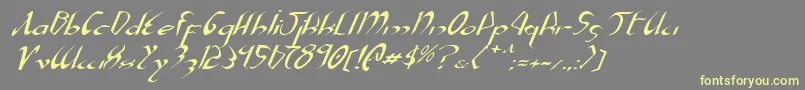 XaphanExpandedItalic-fontti – keltaiset fontit harmaalla taustalla