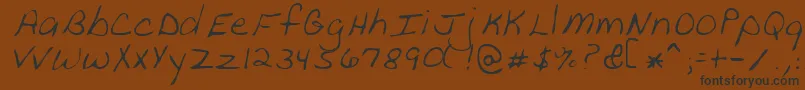 PeanutRegular Font – Black Fonts on Brown Background
