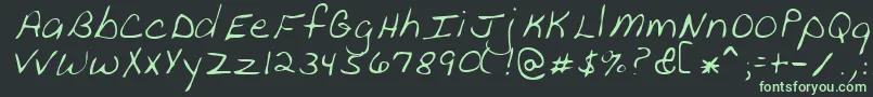 フォントPeanutRegular – 黒い背景に緑の文字