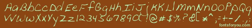 フォントPeanutRegular – 緑色の文字が茶色の背景にあります。