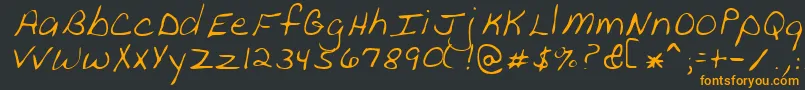 フォントPeanutRegular – 黒い背景にオレンジの文字