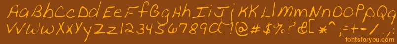 PeanutRegular Font – Orange Fonts on Brown Background