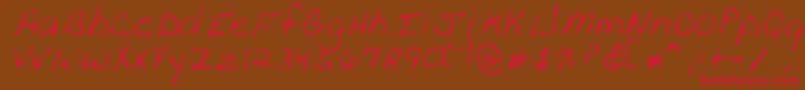 フォントPeanutRegular – 赤い文字が茶色の背景にあります。