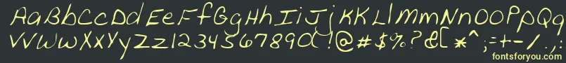 フォントPeanutRegular – 黒い背景に黄色の文字