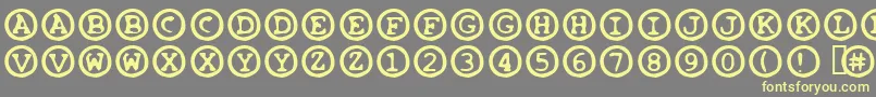 OleeosFartzake Font – Yellow Fonts on Gray Background